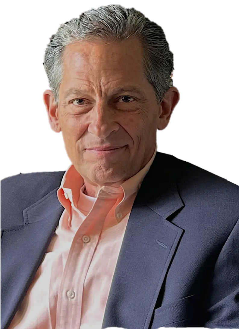 Dennis-Fassett-—-Trusted-Estate-Home-Solutions-Expert-in-Michigan-1-2 Dennis sitting in his office chair, wearing a sport coat, facing the camera with a welcoming and professional demeanor.